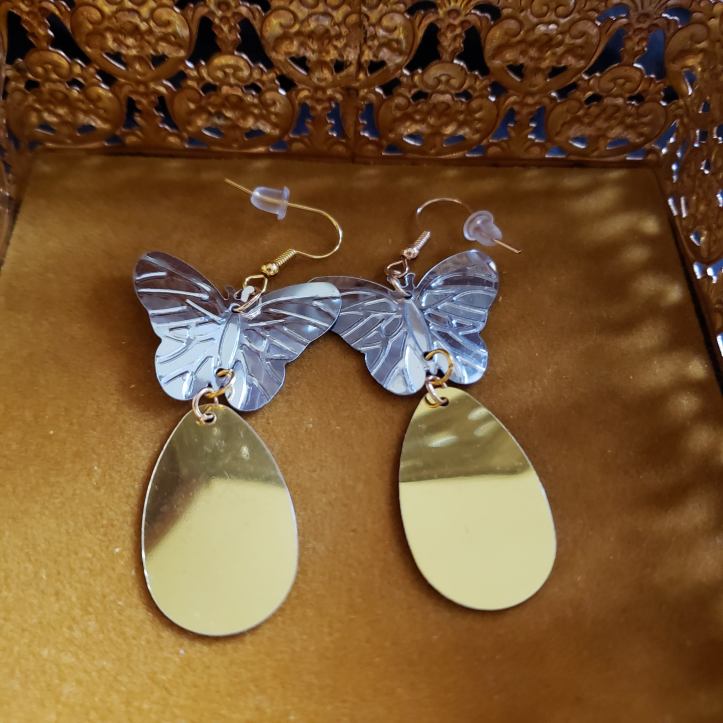 A Pair of Silver Butterfly Earrings with Gold Decorations